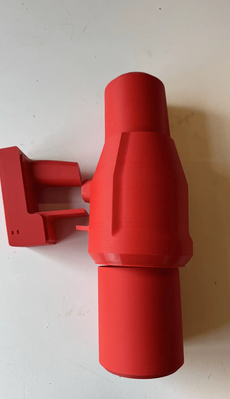 Luma — red printed wall dock, first pass